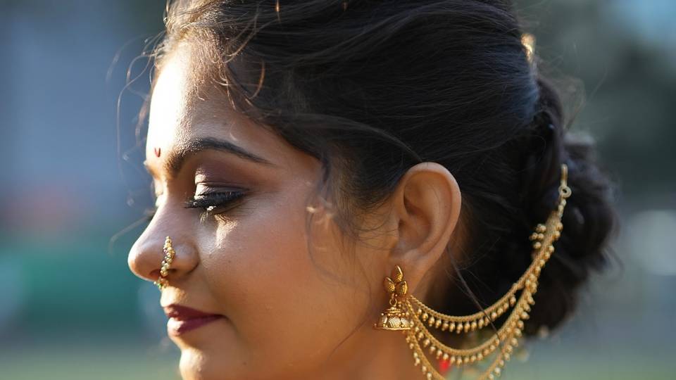Bridal jewellery and makeup close-up